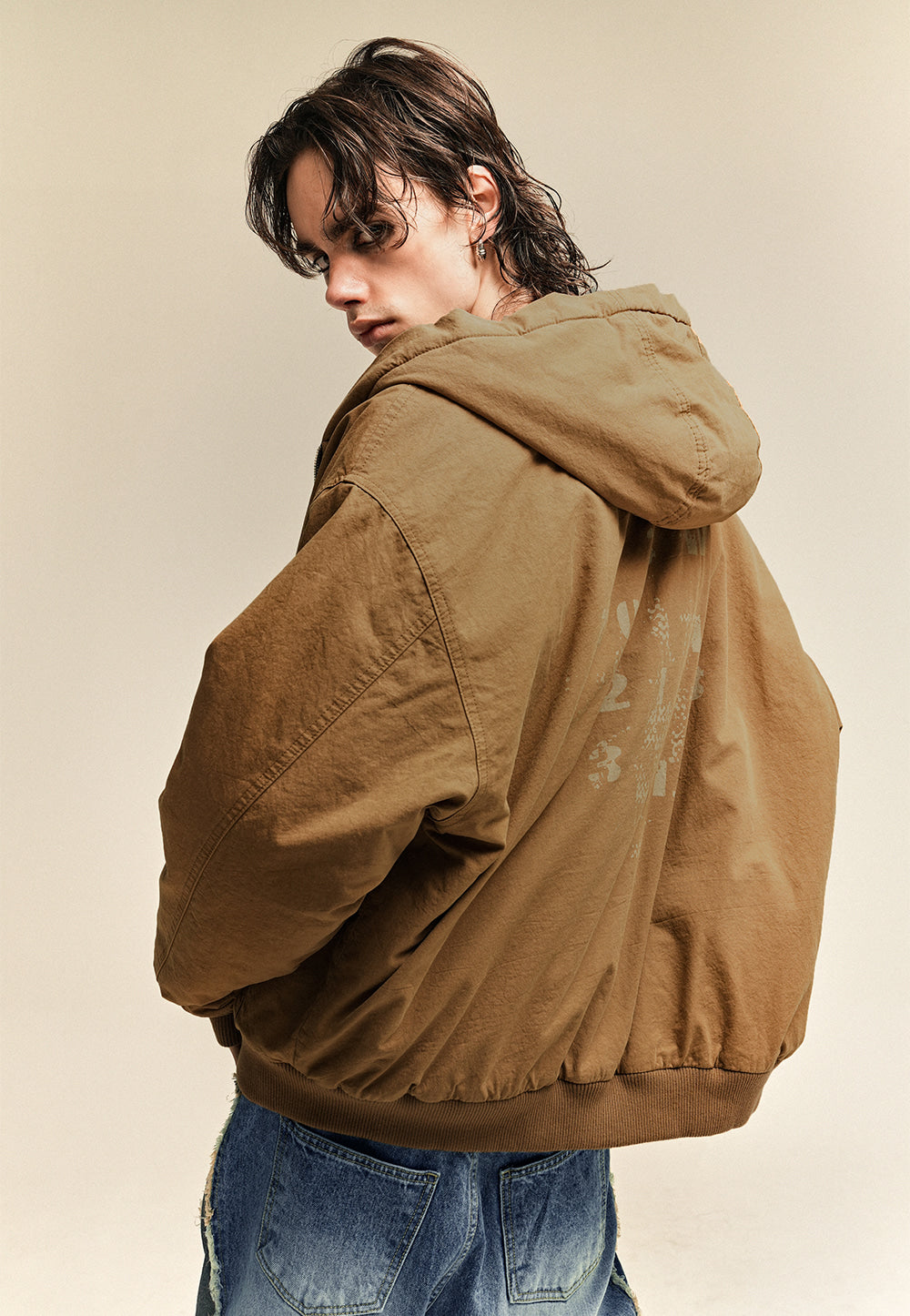 Typo graphic over hood jacket camel